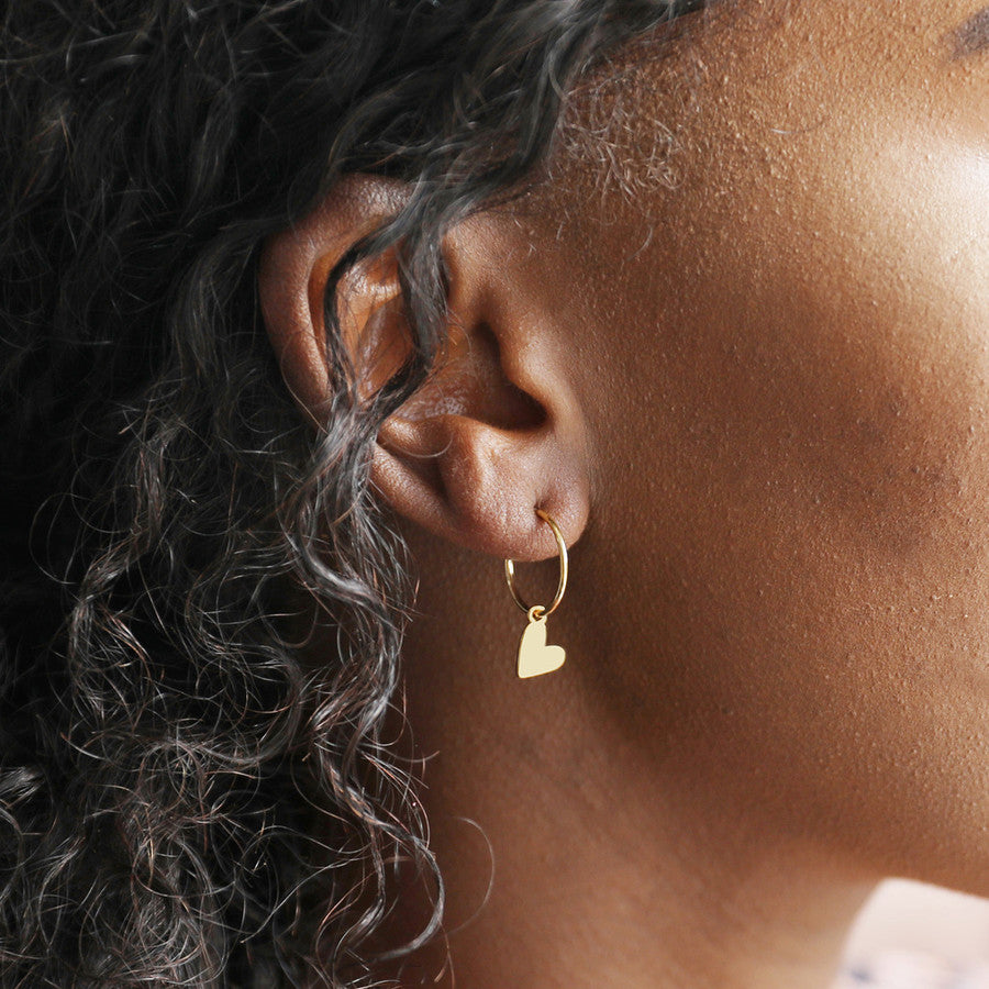 Gold falling heart earrings