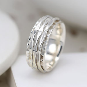 Textured triple spinning band