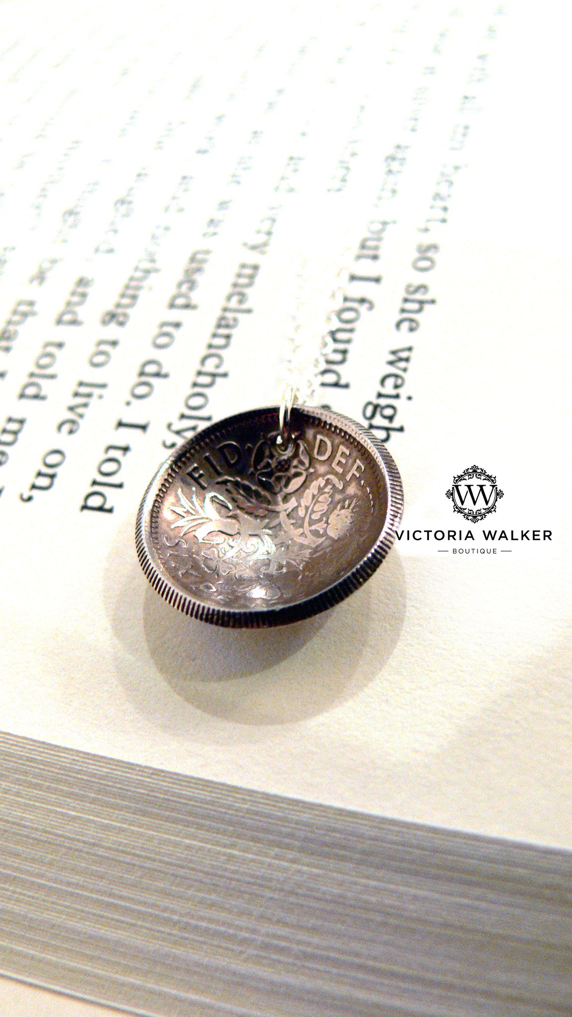 Silver sixpence pendant