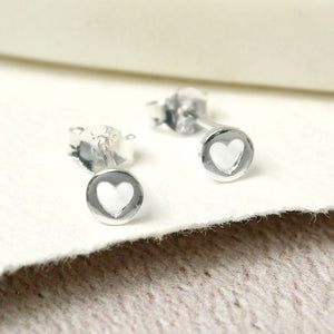 Tiny cut out heart earrings