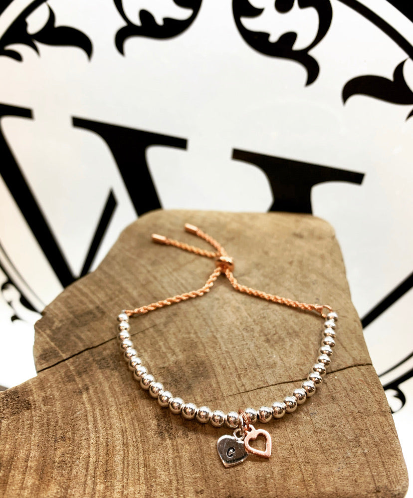 Rose gold and silver love bracelet