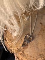 Hearts in hearts ashes pendant