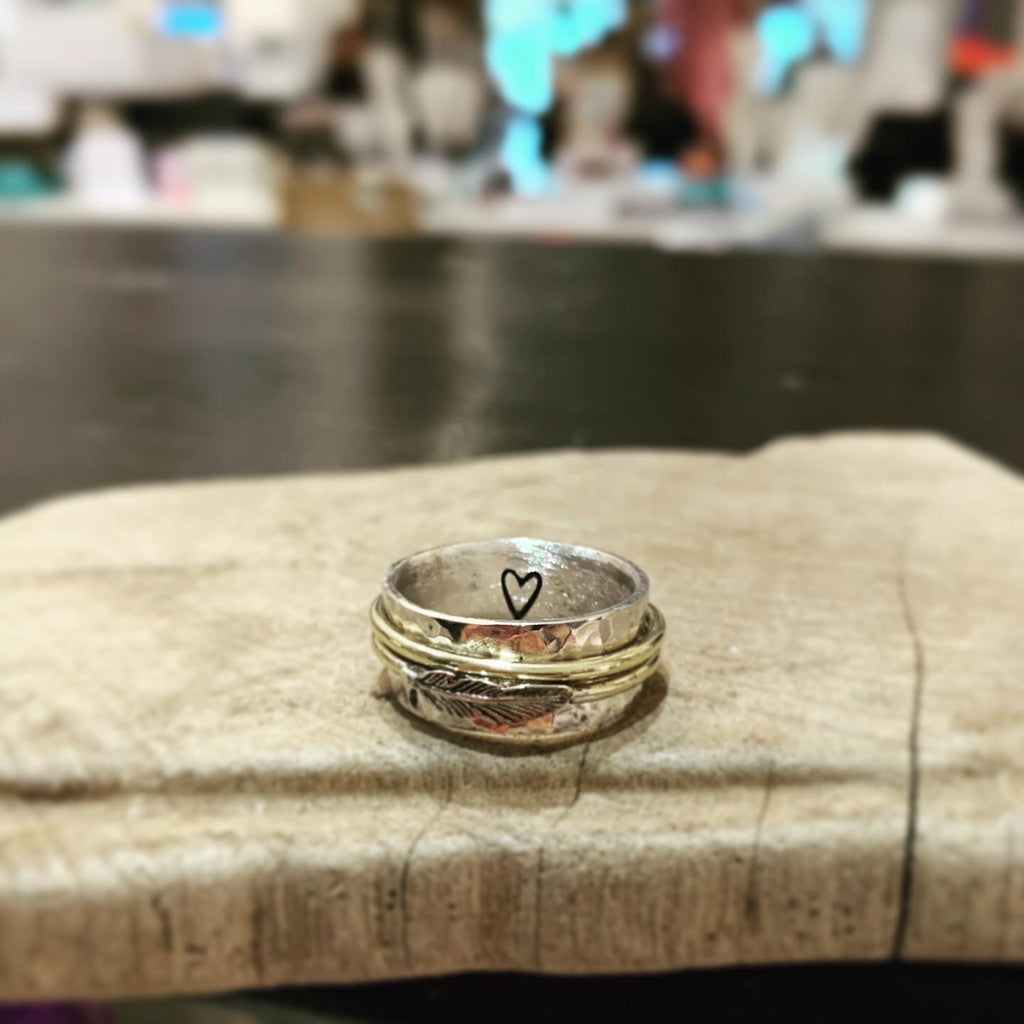 Feather spinning ring