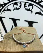 Rose gold and silver love bracelet