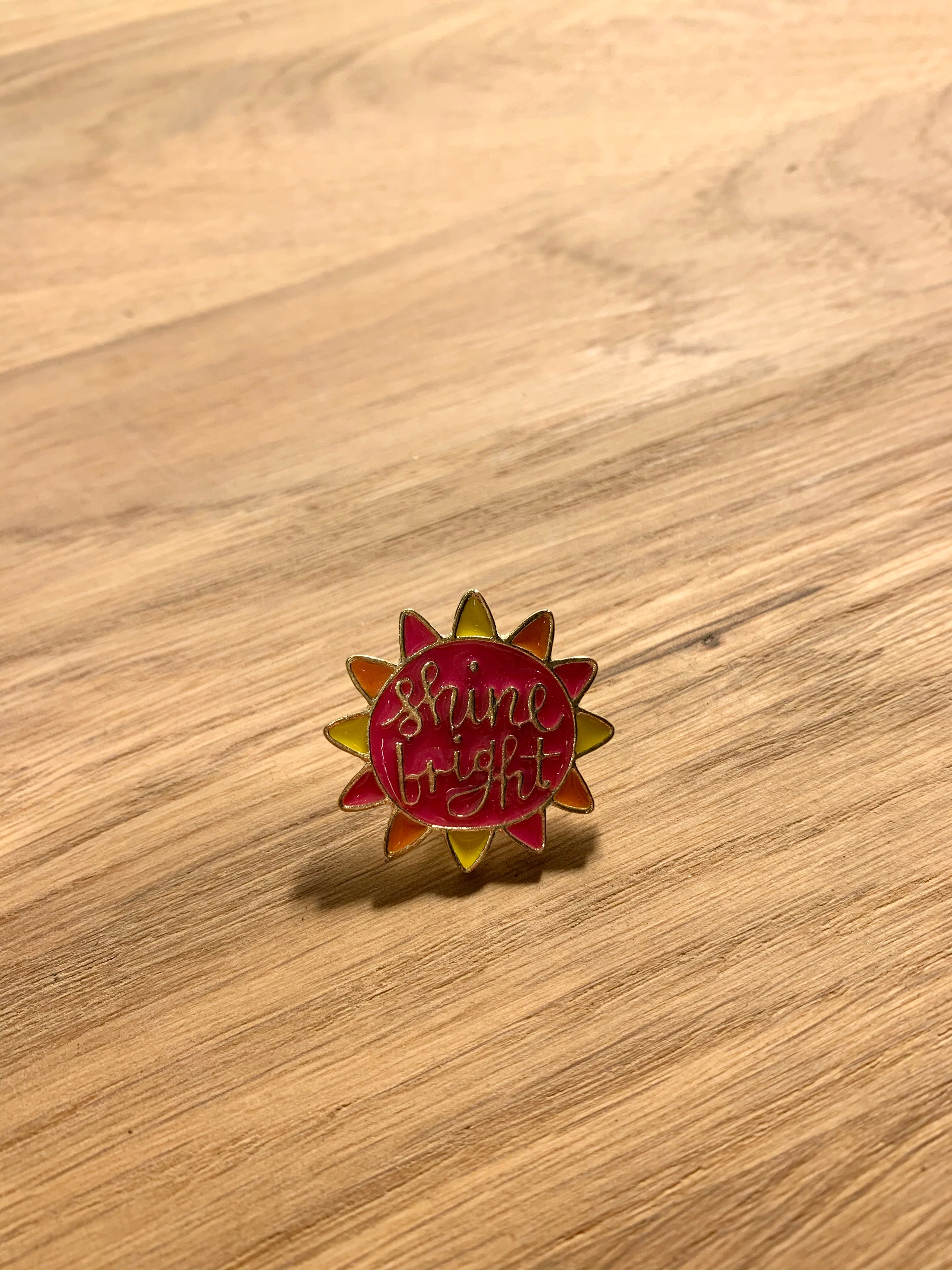 Enamel pin shine bright