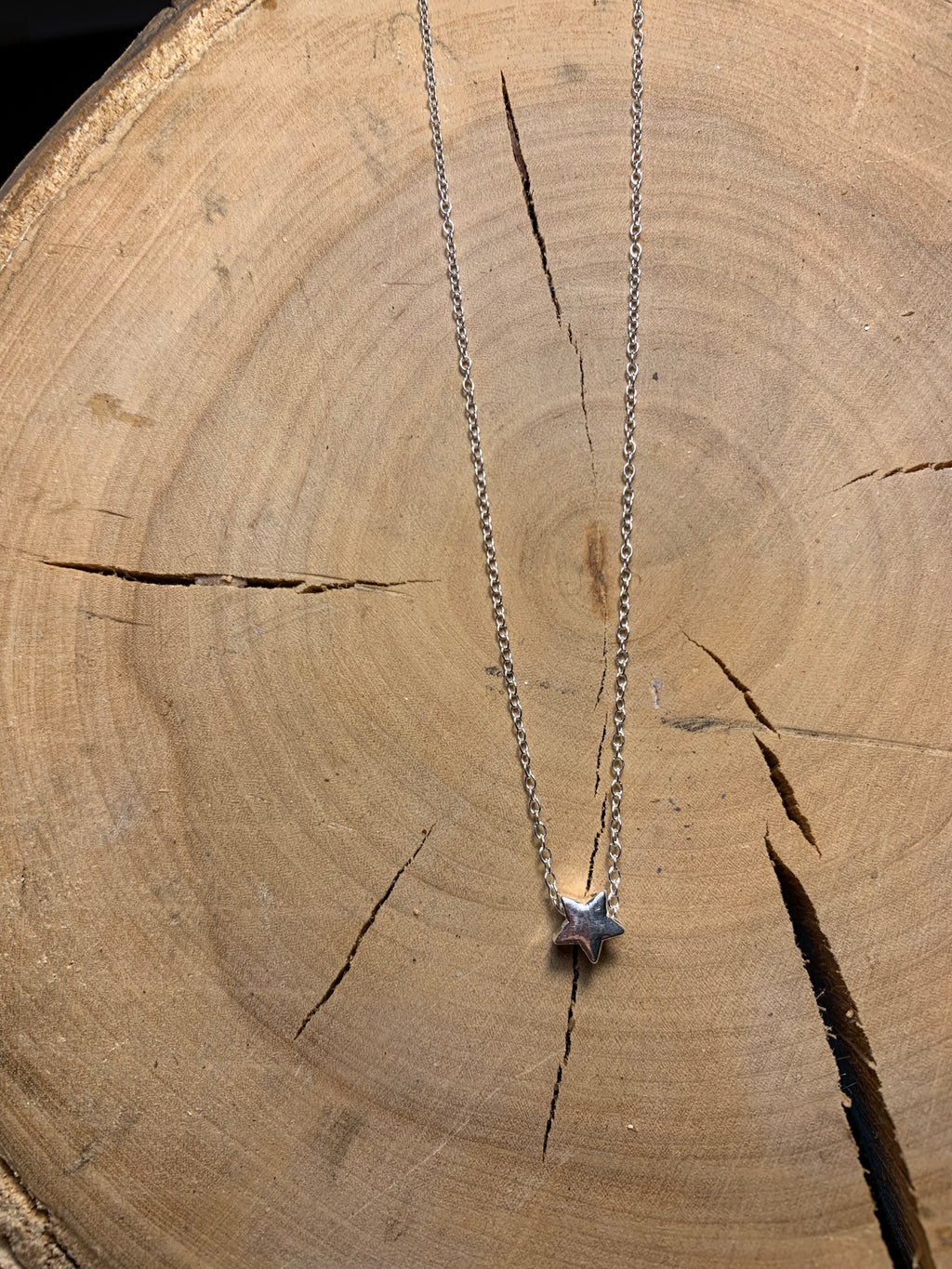 Tiny silver star necklace