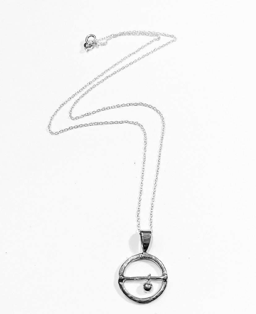 Fidget spinning pendant