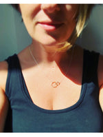 Linked hoop pendant