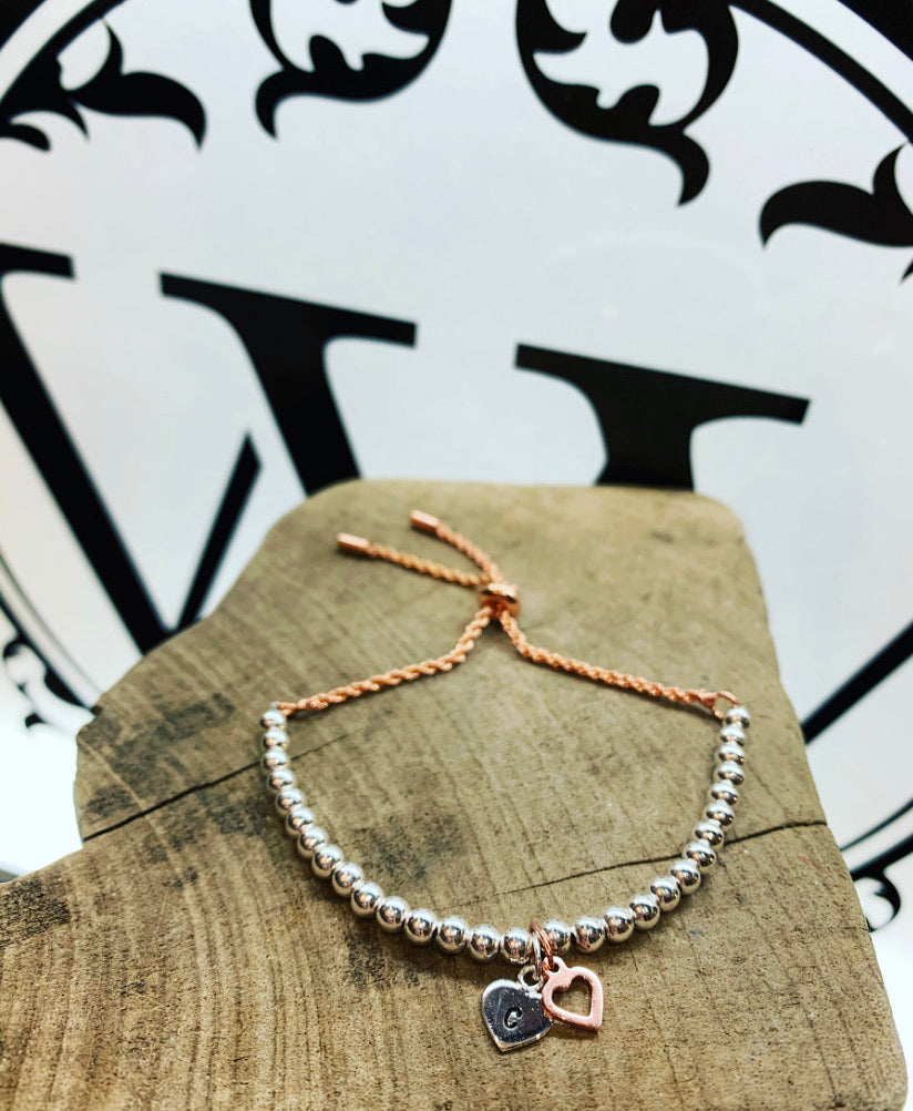 Rose gold and silver love bracelet