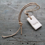 Dinky Porcelain Tag